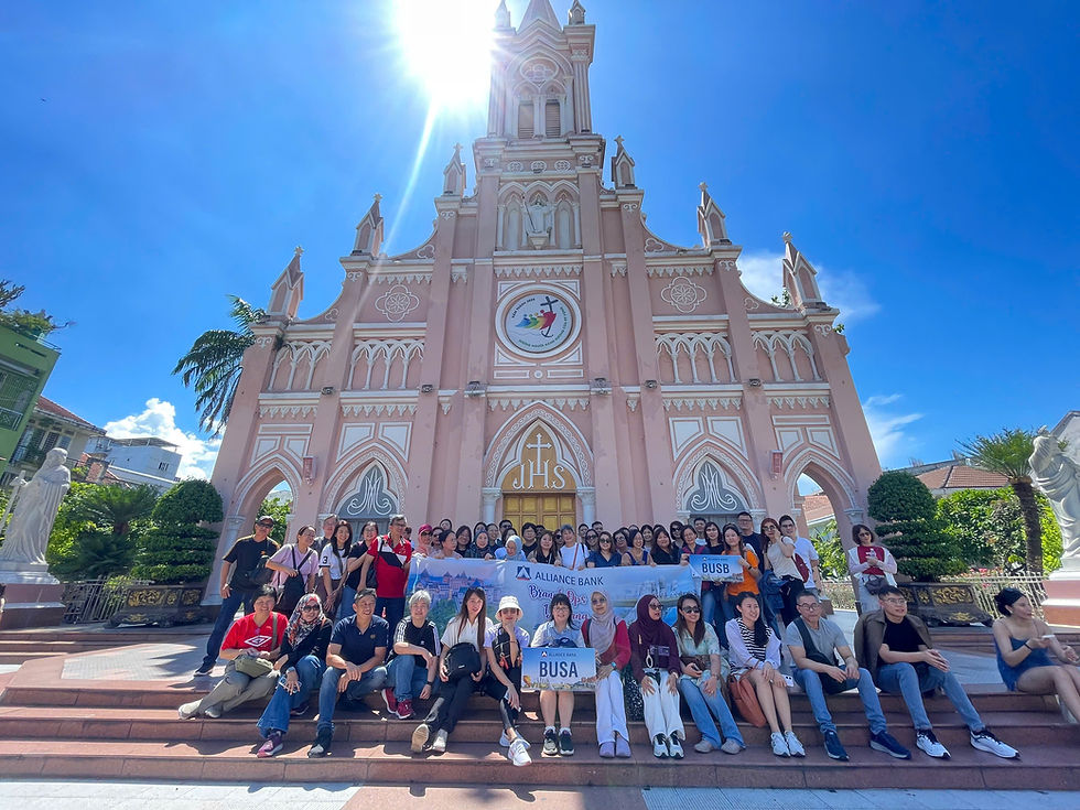 Large Malaysian MICE group photo at Da Nang Cathedral organized by Visit Indochina