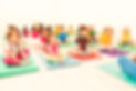 Kids doing butterfly exercise sitting on yoga mats_edited.jpg