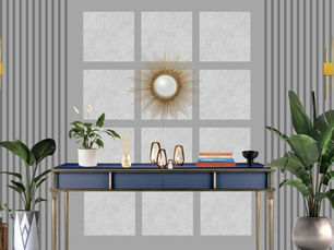 Elegant neutral-toned living area interior design with a navy blue console table, gold sunburst mirror, indoor plants, and vertical striped wall panels – a perfect blend of modern and earthy interior styling.