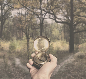 Hand Holding Gold Compass_edited_edited_