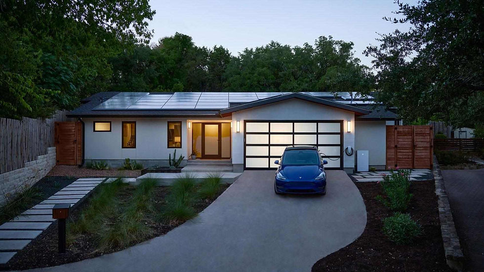 modern home with rooftop solar panels and electric vehicle charging setup showing integrated home energy system