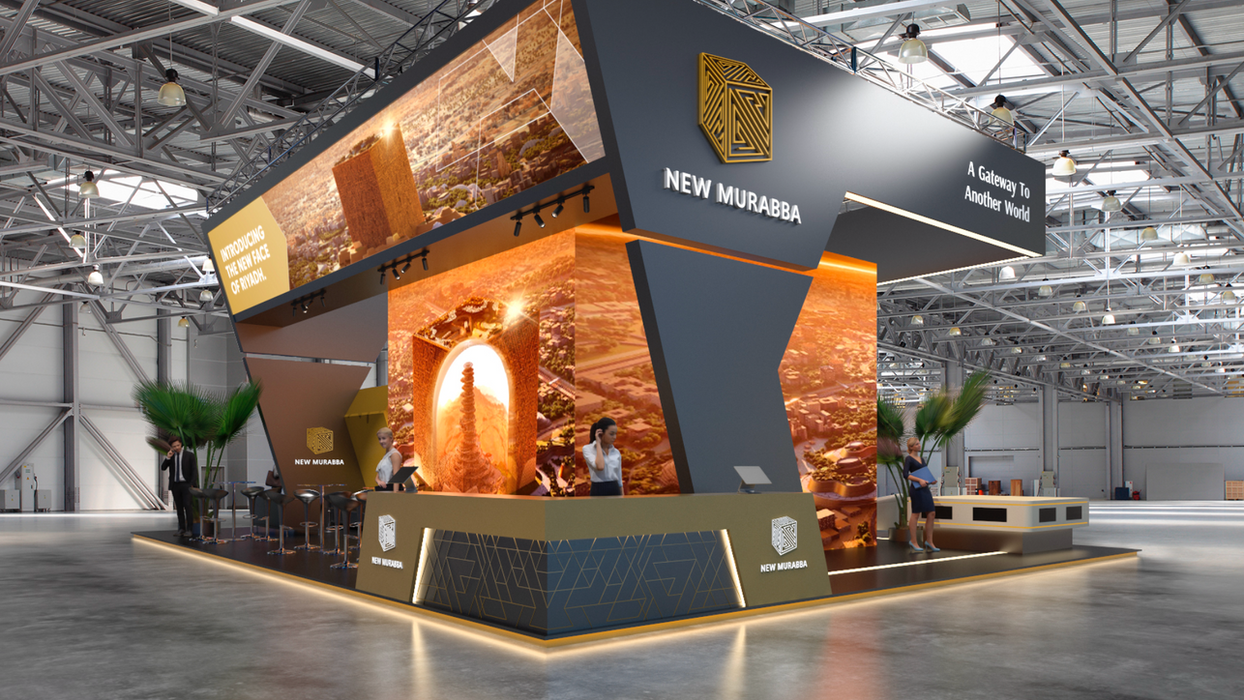 New Murabba exhibition booth with large digital displays and detailed interior design. MIRRORLAB