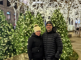 Tour Guests at Zuccotti Park, one of the more popular stops on Vibe NYC Tours Christmas Minibus tour