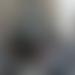 Tourists rubbing the charging bull for good luck