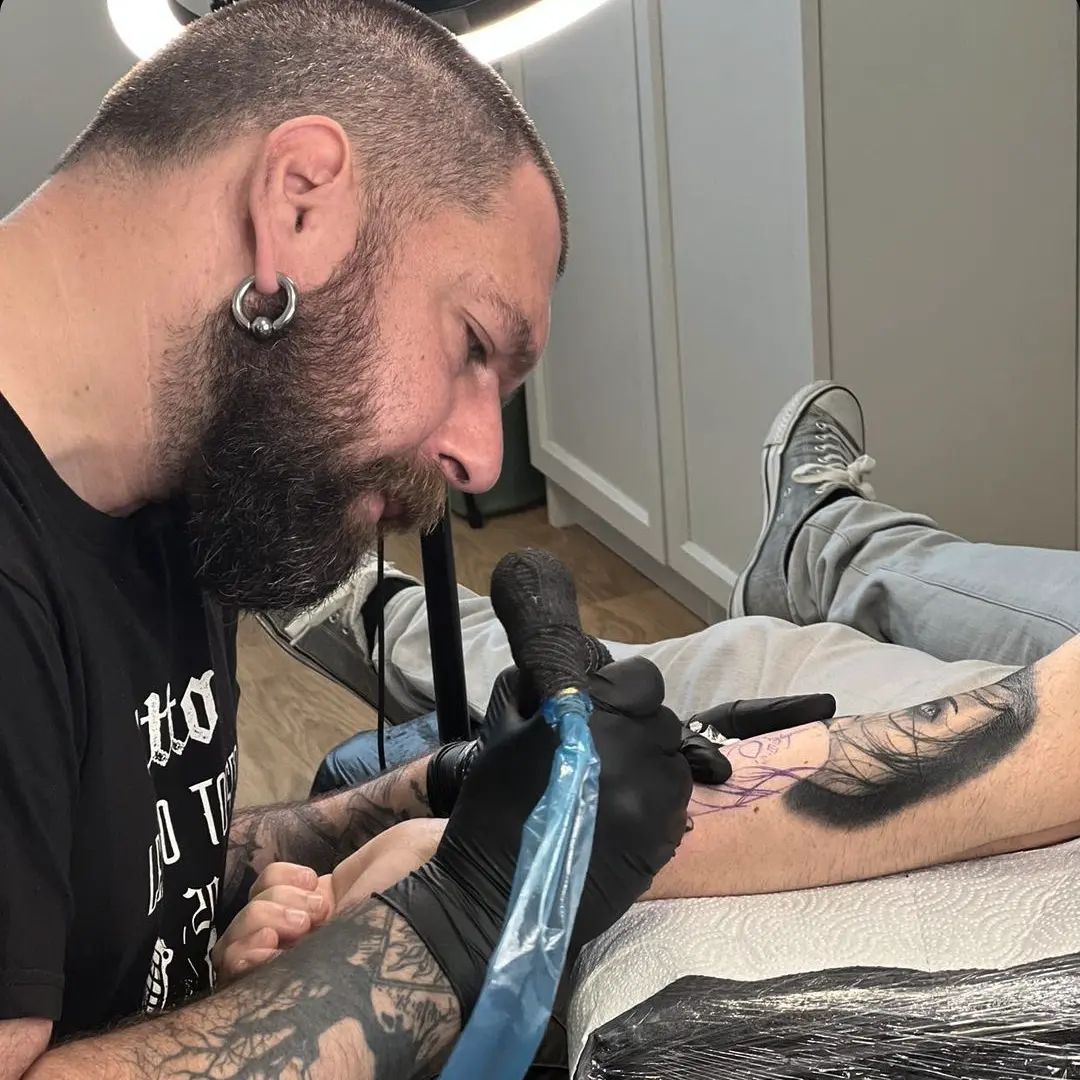 Arise Tattoo