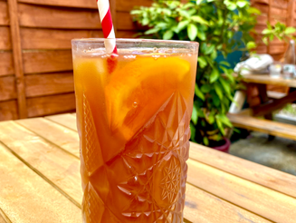 Long glass of Iced Honey Tea to cool off in the garden. (Also available as Long Island π)
