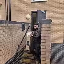 TV being carried during a Leicester Moving Company man and van job in Ashby-de-la-Zouch.