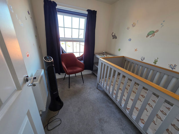 Third bedroom before packing during New Lubbesthorpe full house move.