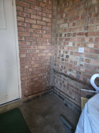 Empty garage area after the second set of CD boxes was removed.