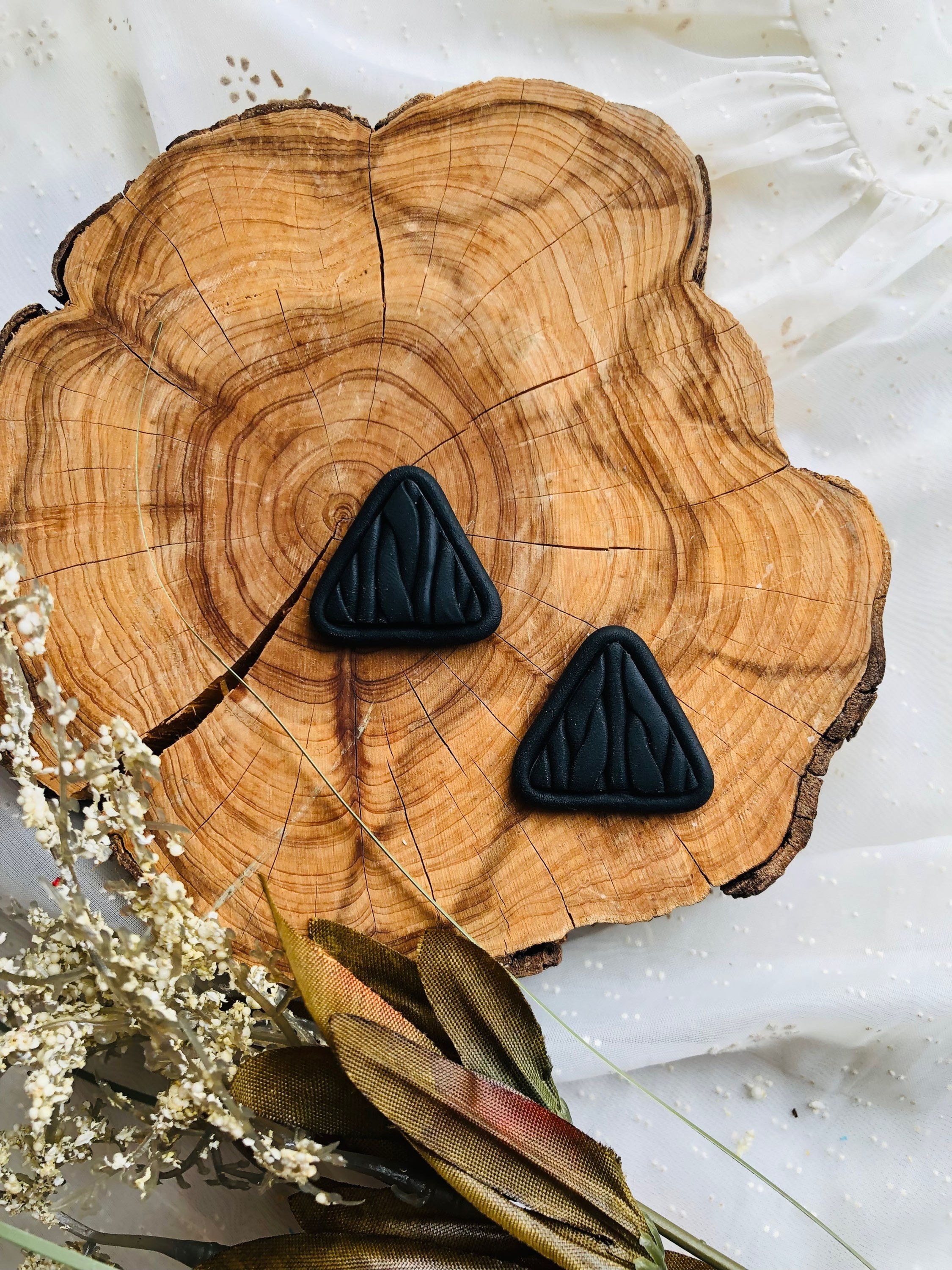 Sweater weather studs in triangle