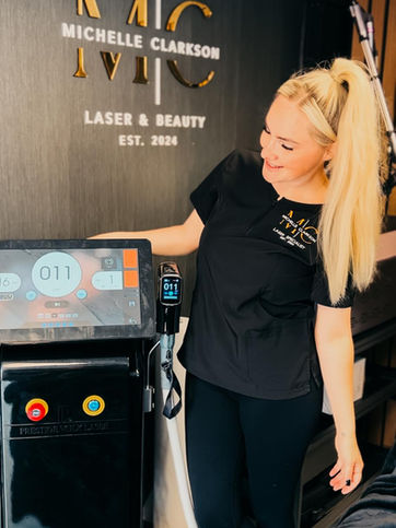 Michelle Clarkson, laser specialist at MC Laser & Beauty, beside medical-grade laser equipment.