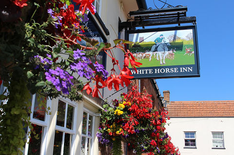pub front and sign, white horse inn somerset