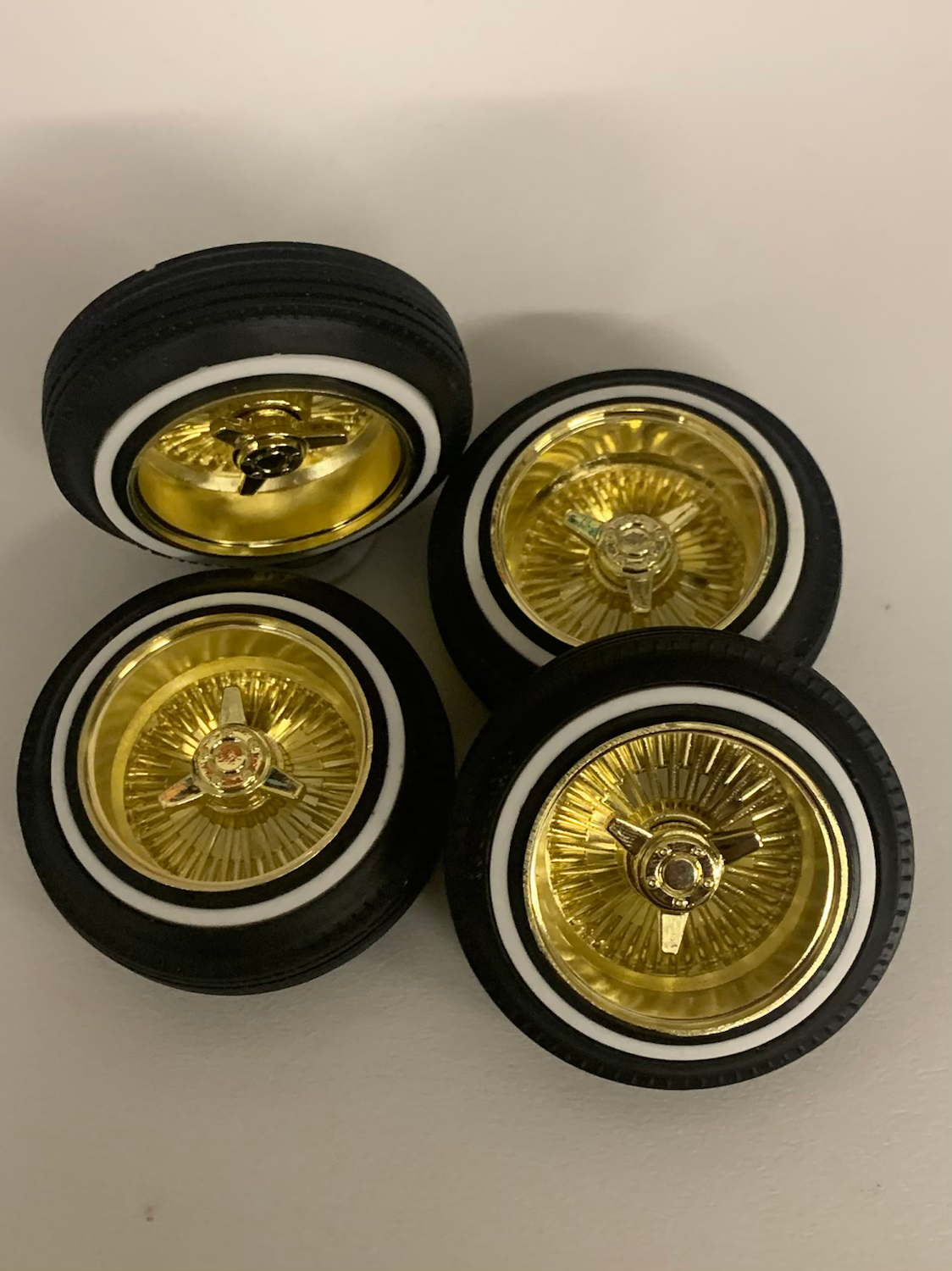 1:10 Gold Real Steel Wire Wheels with the 3 Prong Knock Offs on 520’s