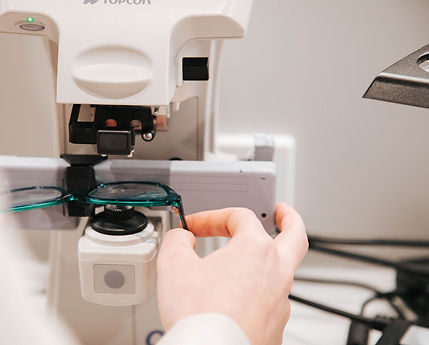 Close up of Aqua Glasses having Prescription Measured