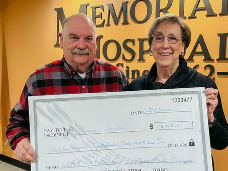 Board Chairman Tom Search and Auxiliary President Mardell Granger