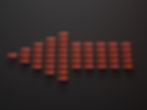 Red arrows on a black background form a larger arrow shape pointing right, symbolizing direction or growth.