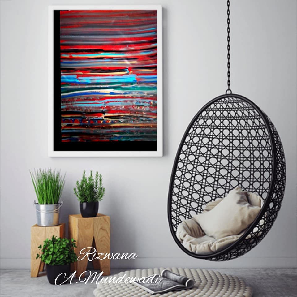 Thumbnail: Abstract painting, hanging egg chair, and plants