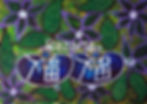 Reiki art with green leaves, purple flowers, two blue symbols with spiritual eyes and 'Razarts' text.