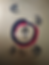 Razarts logo with a Reiki flower symbol and spiral symbols