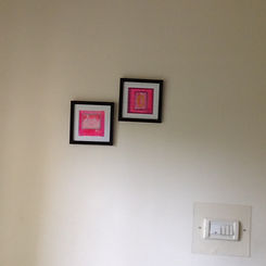tiny art hanging in buyers home.JPG