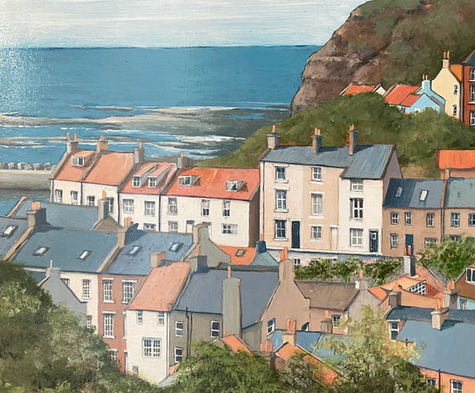 A detailed view from high ground towards a row of Staithes cottages.