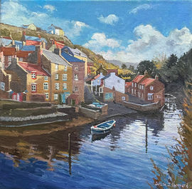 A tranquil view looking over Staithes Beck towards Beckside cottages.