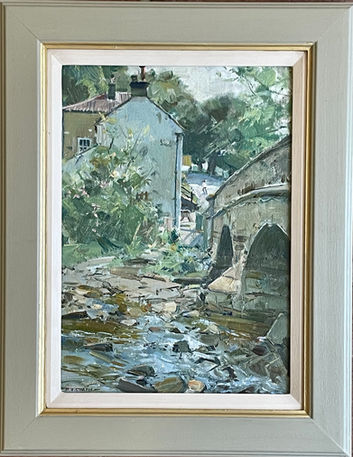 An unusual view looking over the river bed towards the houses at the bottom of the bank at Beck Hole.