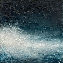 A dramatic monochrome scene of crashing waves.