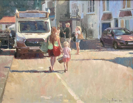 A sunny day on Staithes sea front. A mother and child are heading for the ice cream van.