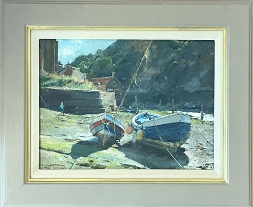 Two traditional fishing boats are lit from behind on the riverbed casting blue shadows into the foreground.