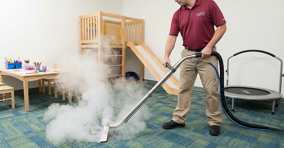 Eye-level view of a professional carpet cleaner using a steam cleaning machine