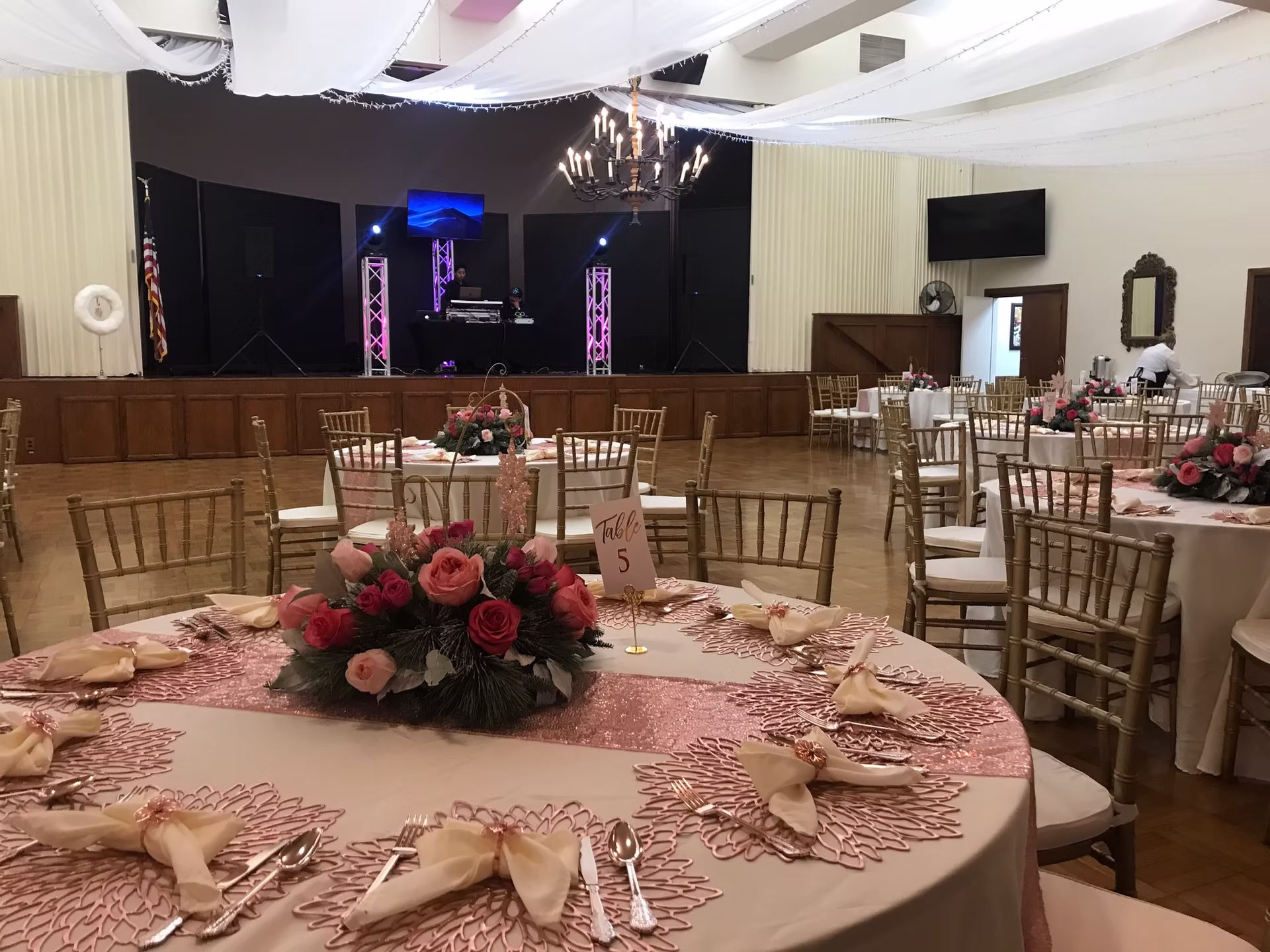 The Poinsettia Pavilion Ventura Room offers dancing, a stage and large wall-mounted monitors