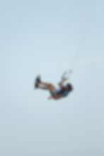 kite instructor jumping