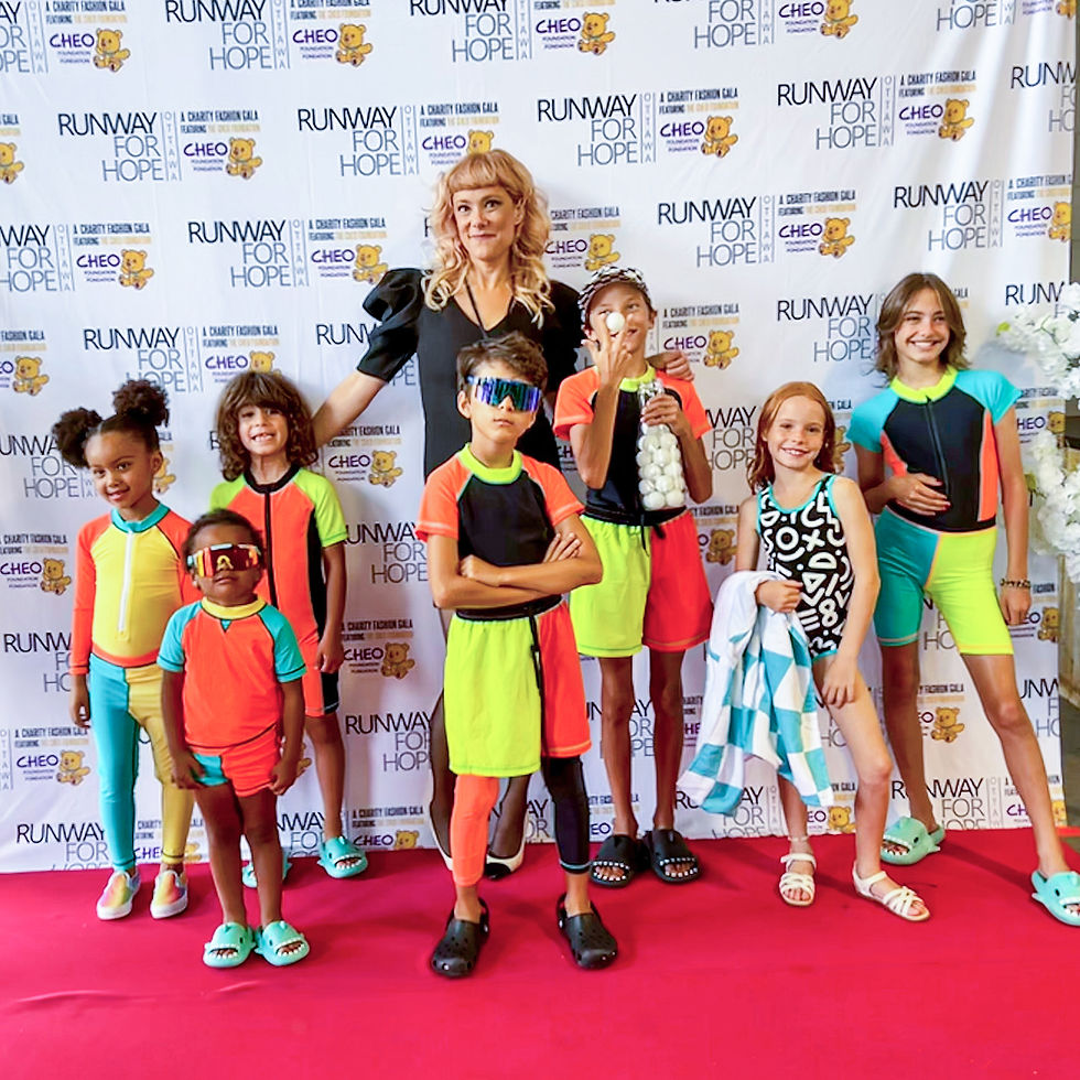 Thumbnail: Collection of SwimHumyn UPF Sun Protective Swimwear on young models at the CHEO Runway for Hope Fashion Show