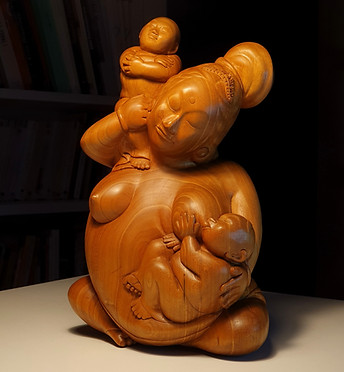 Statue bois femme enfants Bali