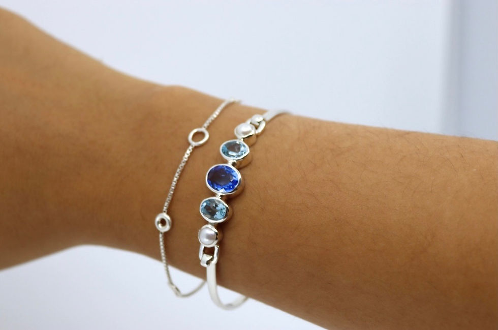 Blue Topaz, Blue Quartz, and Freshwater Pearl Latching Cuff- on model