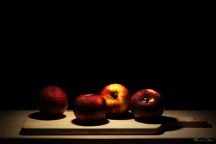 Elegant still life of an apple with contrasting lihgt and shadow