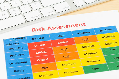 Risk management matrix chart with pen an