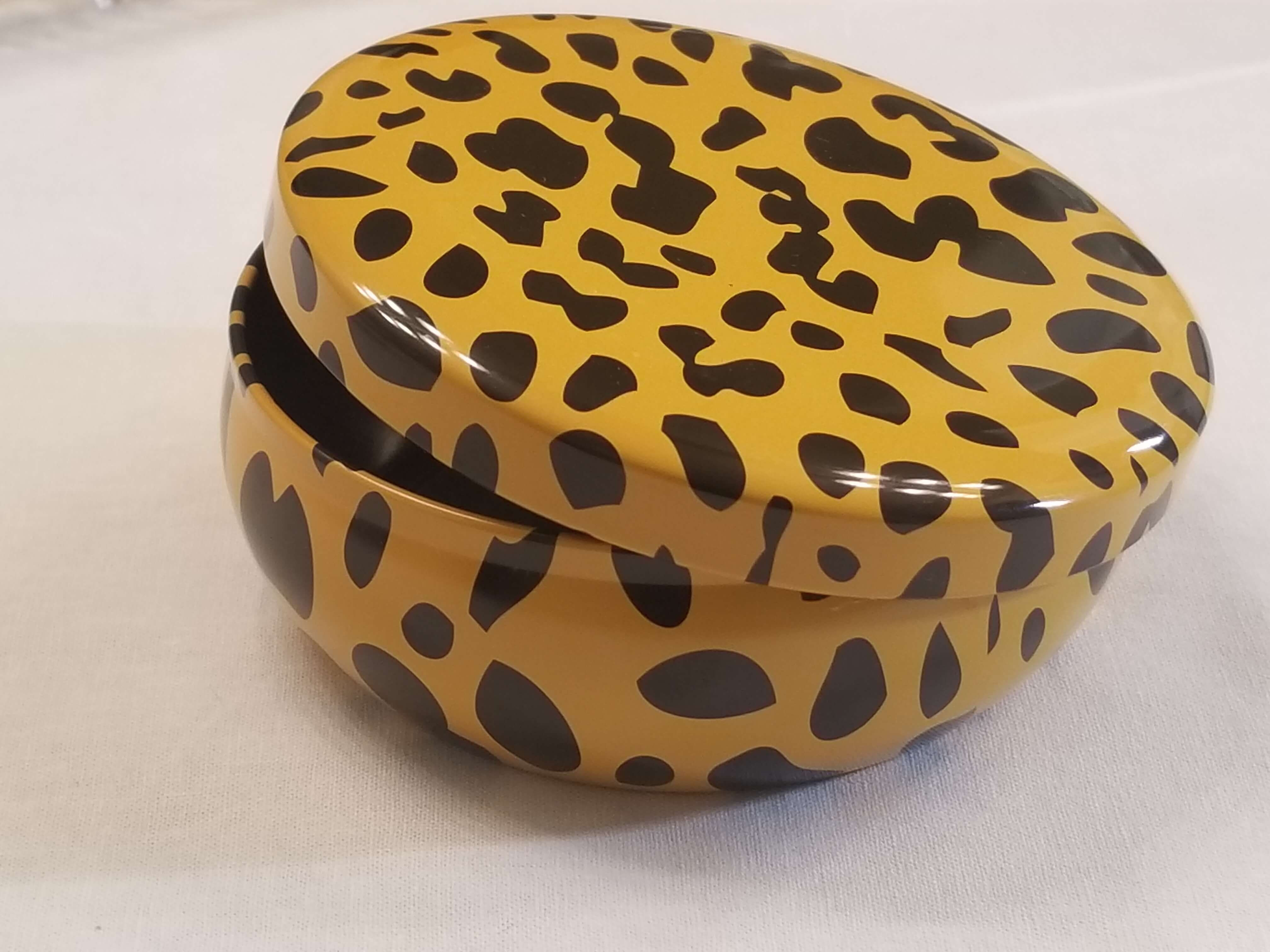 Limited edition cocoa leopard print soy candle tin with lid