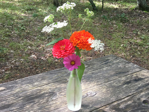 dressing up the camp with flowers from the local brewery