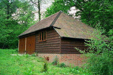 Oak framed enclosed 2 bay garage with store area