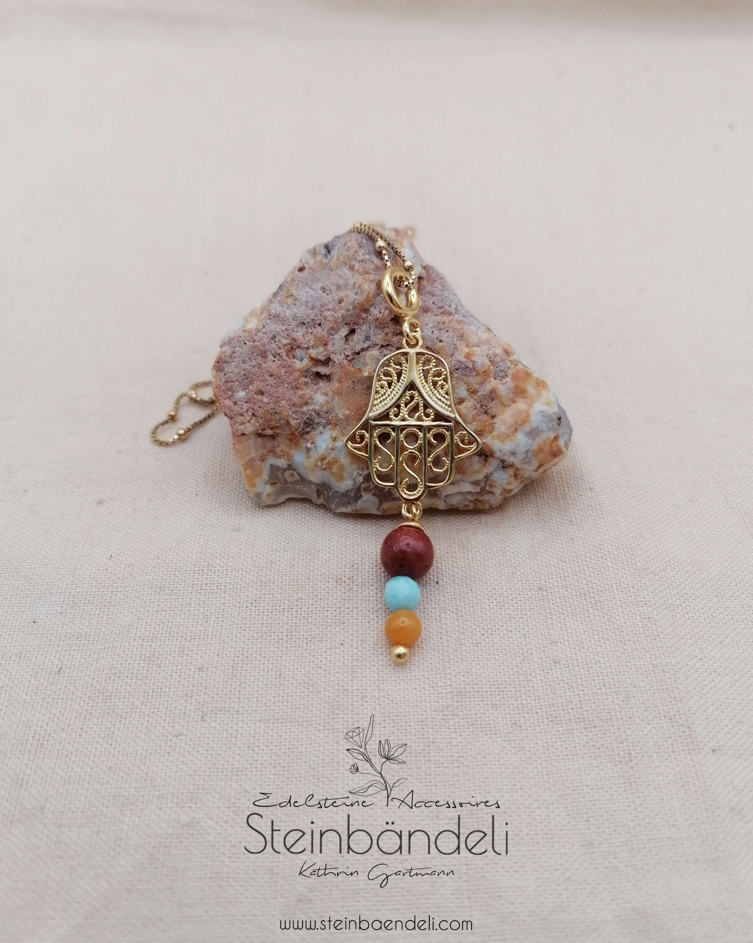 Steinbändeli Charms Fatima "Jaspis/Larimar" vergoldet 