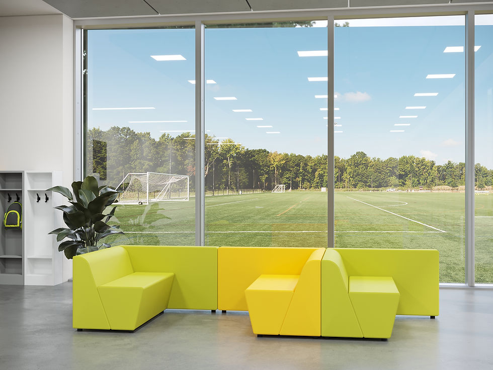 Flexxform Sol collection in an elementary school, with lockers and a soccer field outside the window.