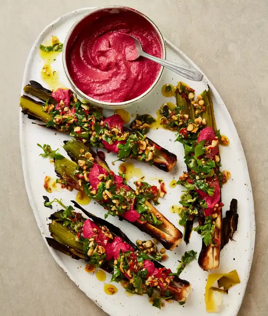 Roast leeks with beetroot humus