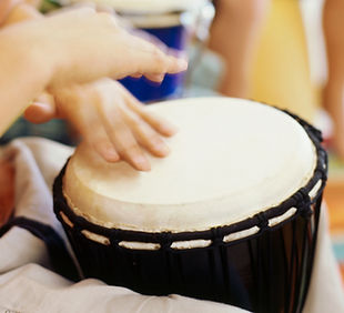 Playing Hand Drum