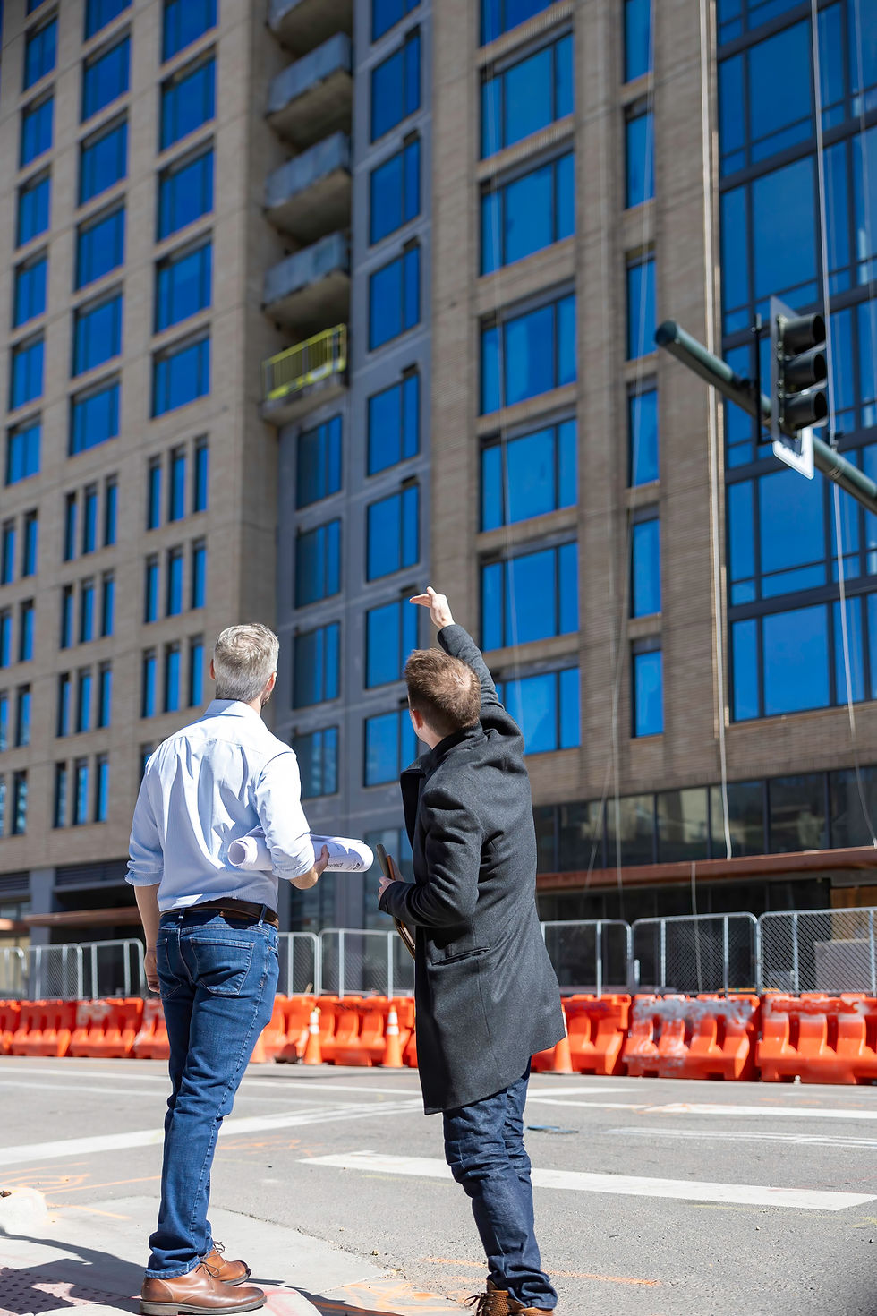 Anthony Gengaro and Seth Donell examining a building
