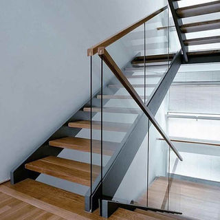 floating staircase with glass railing