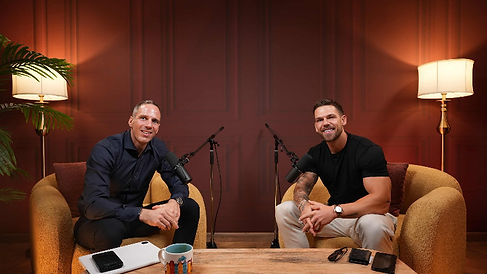 Two male guests on comfy leather sofa studio interview at podcast studio Dubai Dubai podcast studio