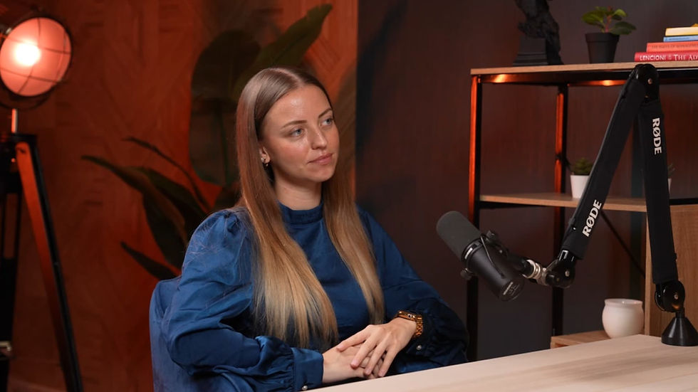 Host starting a podcast session in the Dubai podcast studio