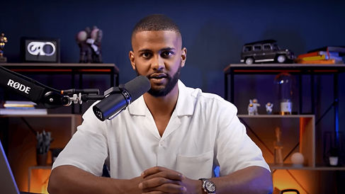 Solo male guest at modern desk with background setup podcast studio Dubai speaker Dubai podcast studio